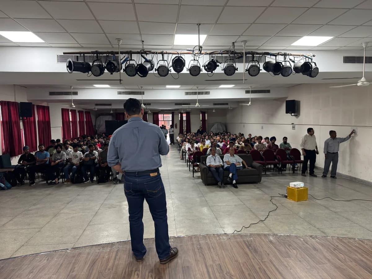 A seminar session in the TechCADD auditorium, with students seated through the hall