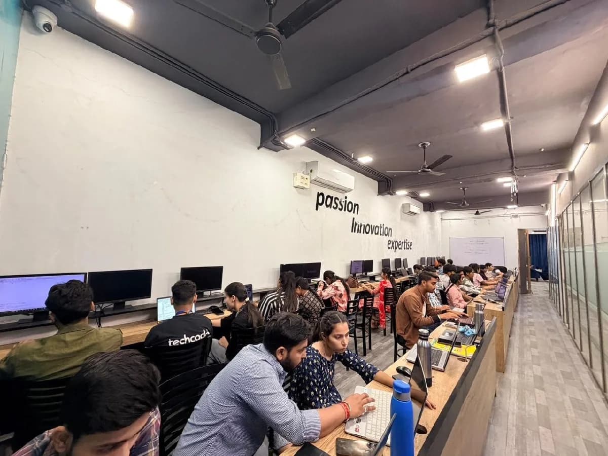 The TechCADD workstation floor in Hoshiarpur, full of students at work