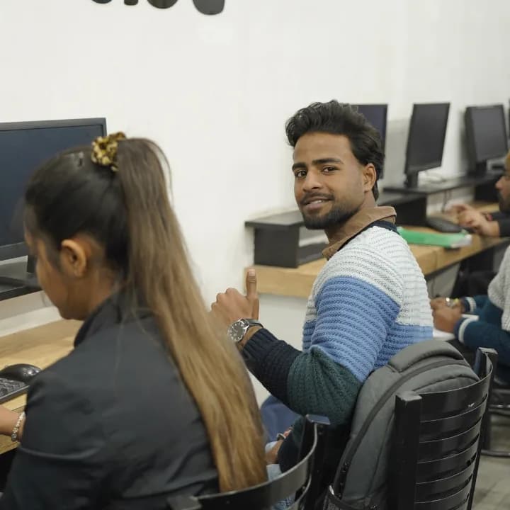 Students working at the machines in a TechCadd lab