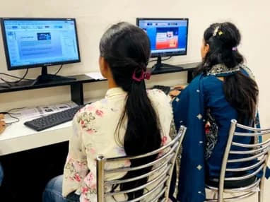Trainees at work on the TechCADD lab floor